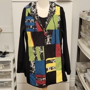 Reversible vest with hood